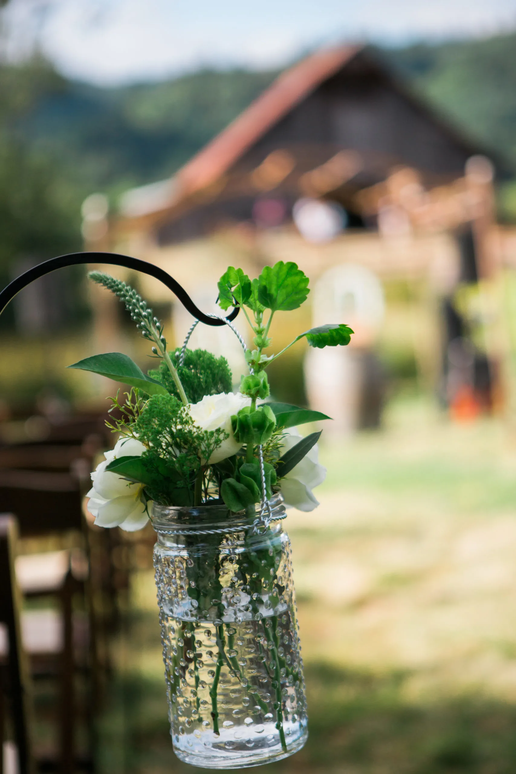 Mason jar and shepherd hook floral arrangments