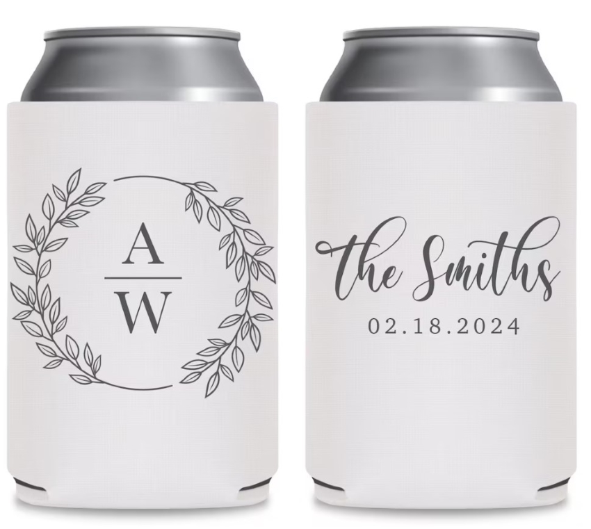 White double-sided koozie with round floral frame with initials inside on one side and the smiths with a wedding date on the other side